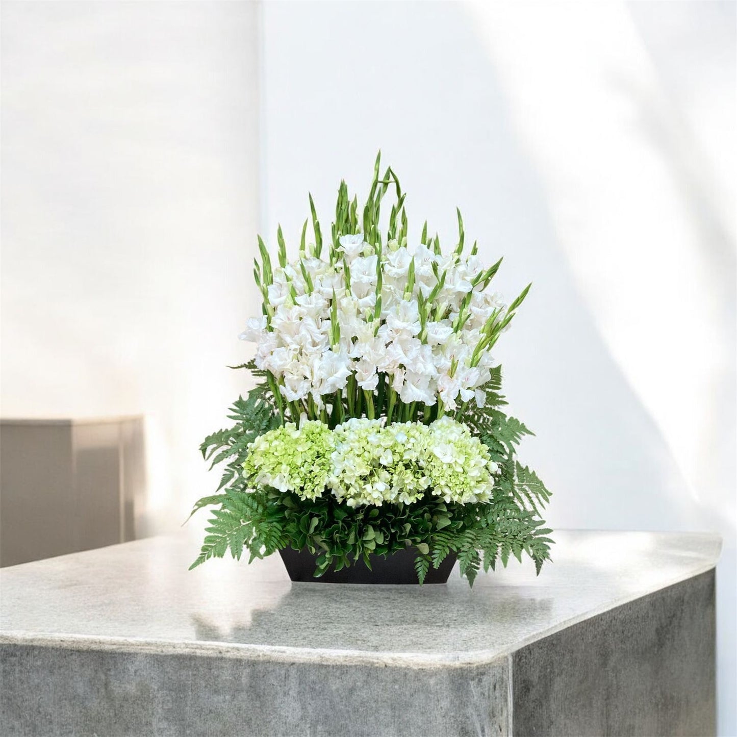 Arreglo fúnebre con hortensias