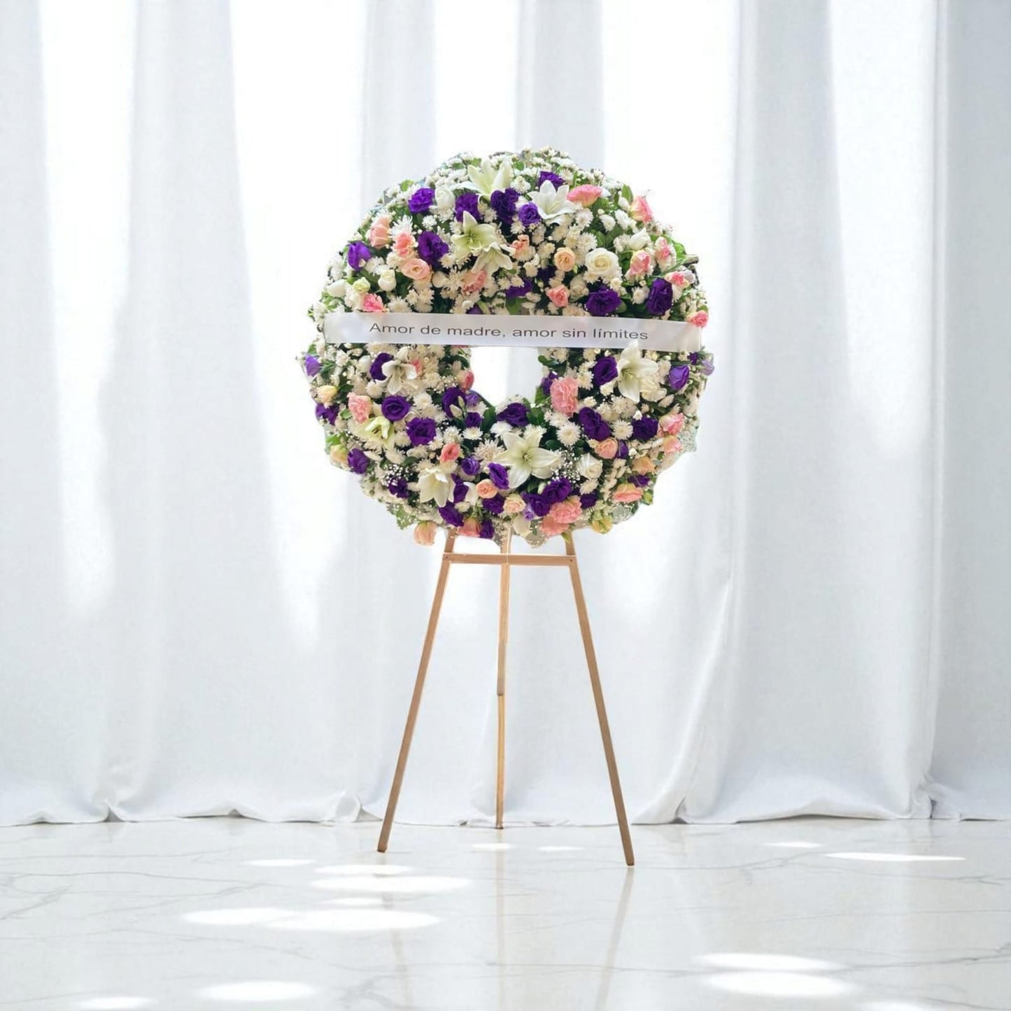 Corona fúnebre lisianthus rosa y morado